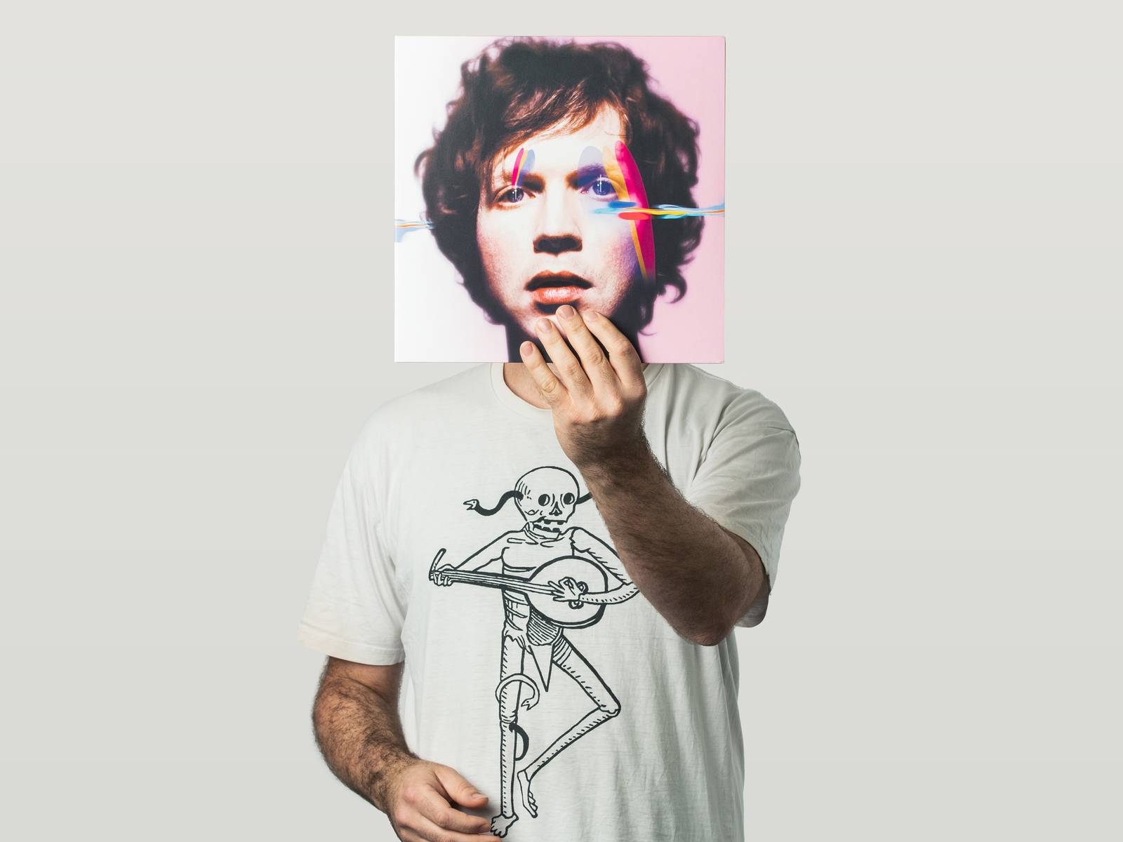 Joe holding a Beck album