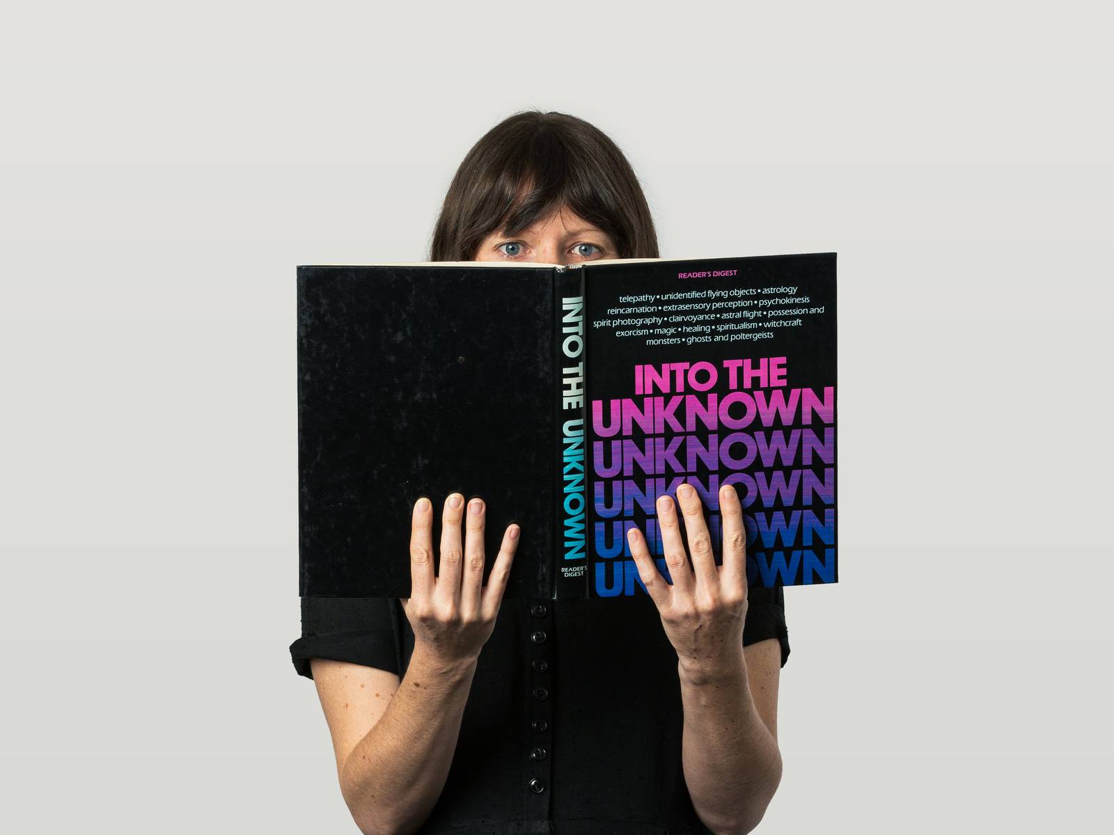 Lizy reading 'Into The Unknown' book