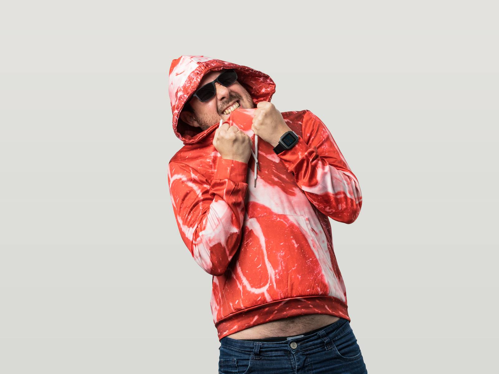 Michel Mattos in a bright hoody and shades